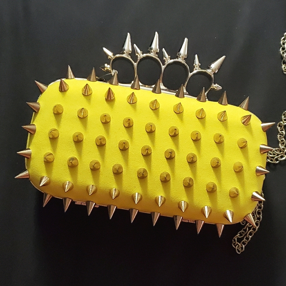 Yellow Four Finger Spike Clutch